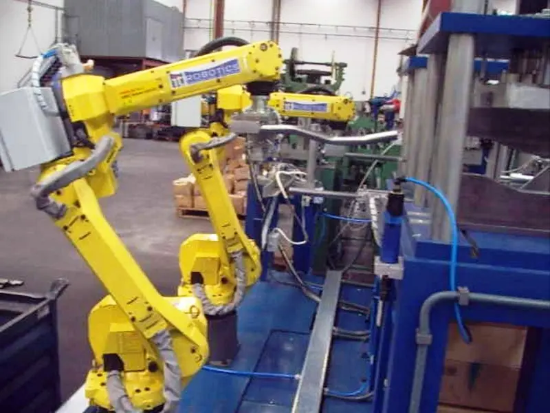 carga y descarga de maquinas robotica - Cuál es el papel de los robots en la carga y descarga